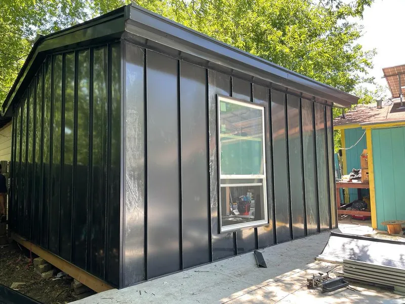 Black standing seam metal wall panels for Metal Roof Installation in Greenville